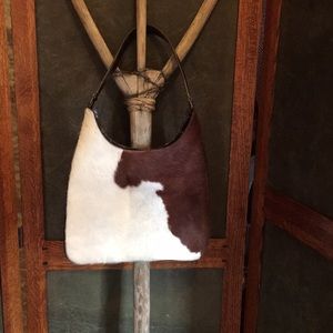 Pony Bag cowhide purse.